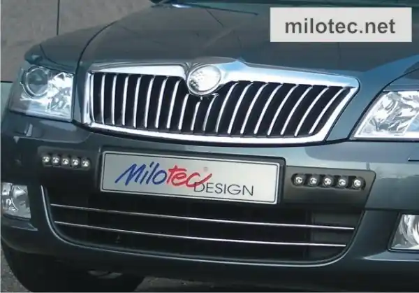Škoda Octavia II facelift - LED denní světla Hella s krycími plasty z černého ABS/ASA Tovární Cena